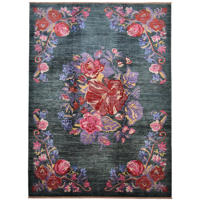 Dark green hand-knotted wool pile Handmade Afghan Gul Ferang carpet with floral design.