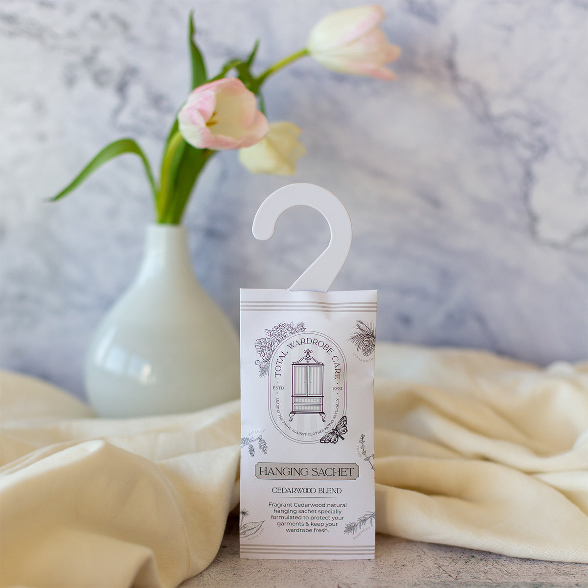 Hanging moth repellent wardrobe sachets with cedarwood blend fragrance for natural moth protection and fresh-smelling wardrobes.