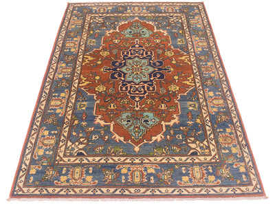 A traditional 6x4 oriental Heriz area rug with a complex geometric and floral pattern, featuring a central medallion in rust red and teal, surrounded by a blue field and beige borders.
