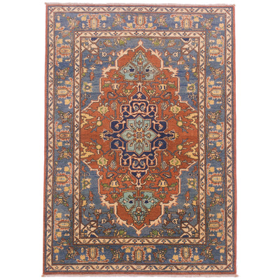Afghan Handmade Heriz rug; terracotta/rust with blue, geometric medallion design.