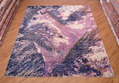 Stylish modern Abstract Himalaya carpet hand-knotted with mauve purple, light and dark blue wool, touches of olive green as well areas of white viscose silk. Broad gestural design.