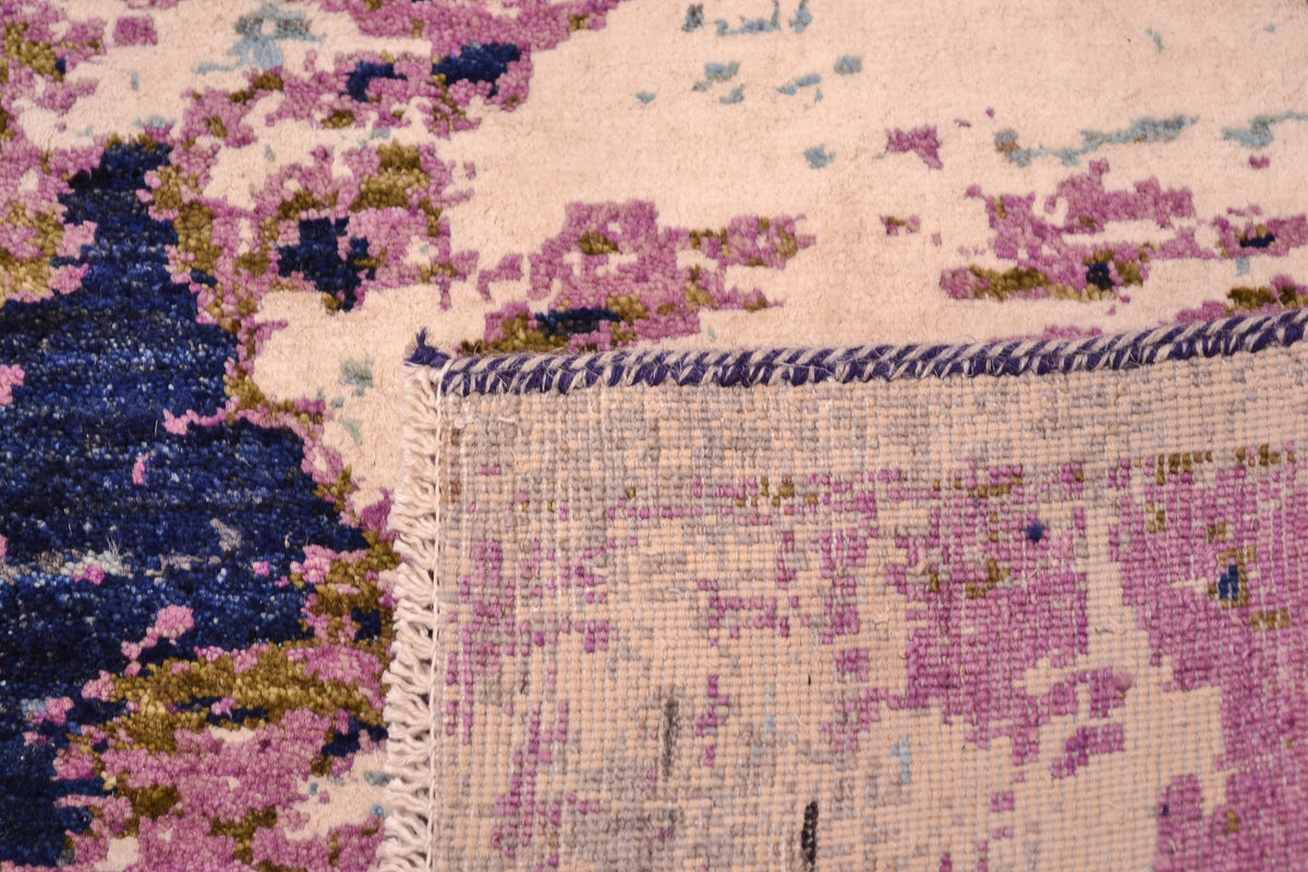 Hand-knotted weave detail from back of abstract Himalaya carpet with woll and art silk pile.