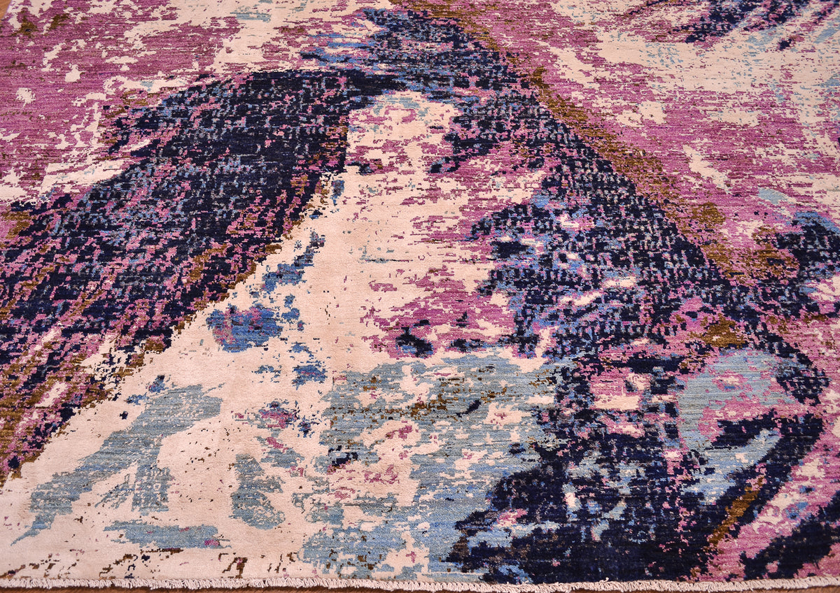 Design detail of hand-knotted abstract Himalaya carpet. Inpsired by natural forms like mountainess terrain.