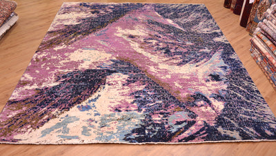 Overall view of abstract modern carpet with natural formation designs with sweeping gestural design and large areas of art viscose silk.