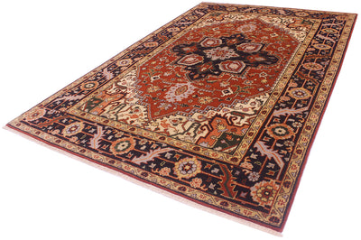 A traditional handmade Indo Heriz rug with a complex floral and geometric pattern, featuring a dominant rust-red center, dark navy borders, and accents of beige, green, and orange, shown on a plain white background.