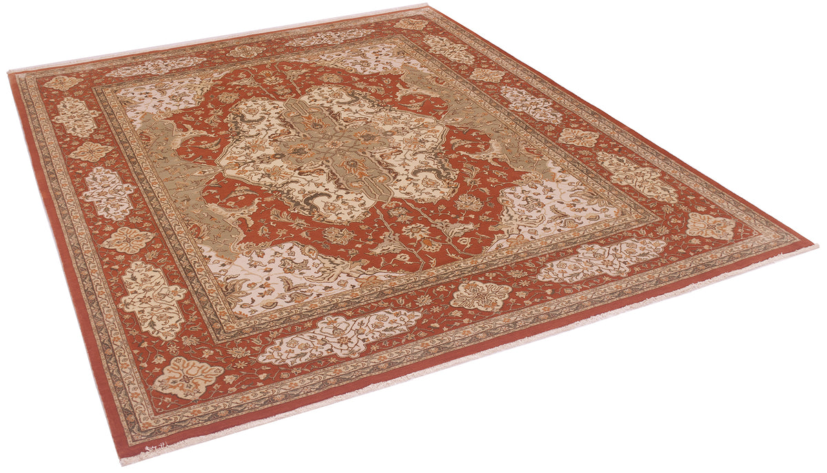A traditional oriental-style area rug with an intricate floral and medallion pattern in rust red, beige, and cream, shown from an elevated angle on a white background.