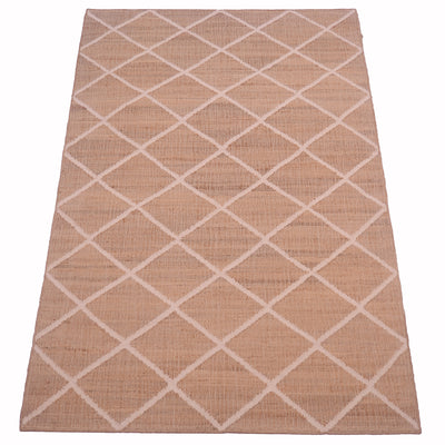 Beige ground kilim with lattice design on a white background
