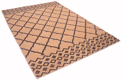 A rectangular area rug with a warm tan base and a dark brown geometric diamond lattice pattern, shown at an angle on a plain white background.