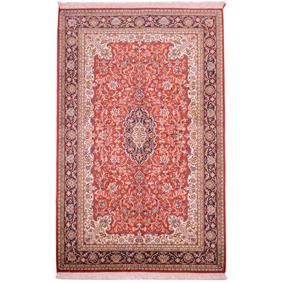 Elegant silk on cotton hand-knotted Indian fine Kashmir Silk rug with floral medallion design featuring a red field with navy medallion and border.