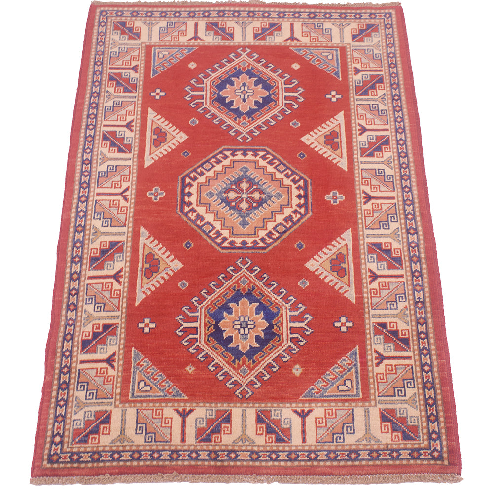 Red handmade Kazak rug with central diamond medallions and blue patterned border