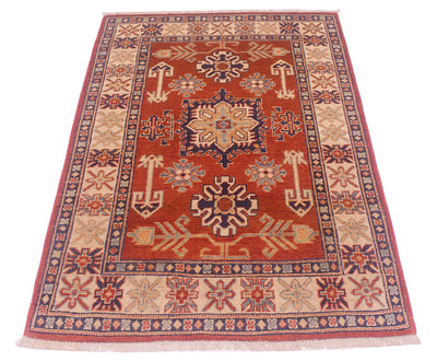 Handmade Kazak rug with rust-red field, dark-blue frame border, and orange geometric motifs