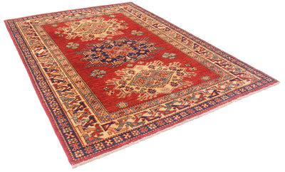 A traditional oriental Afghan kazak rug with a red field, featuring intricate floral medallions and a detailed patterned border in navy blue, beige, and rust red, shown on a plain white background.