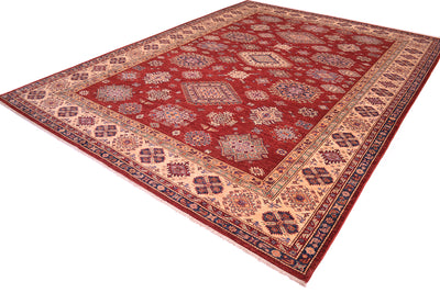 A traditional Large handmade red fine Kazak carpet with a deep red field, beige borders, and intricate blue and cream geometric patterns, shown from an elevated angle on a white background.