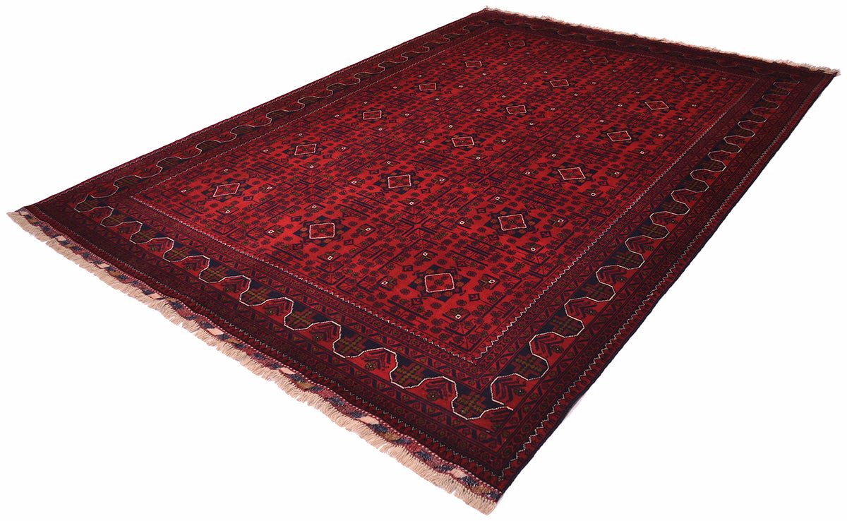 Decorative Afghan rug with intricate patterns in red and blue/black on a white background