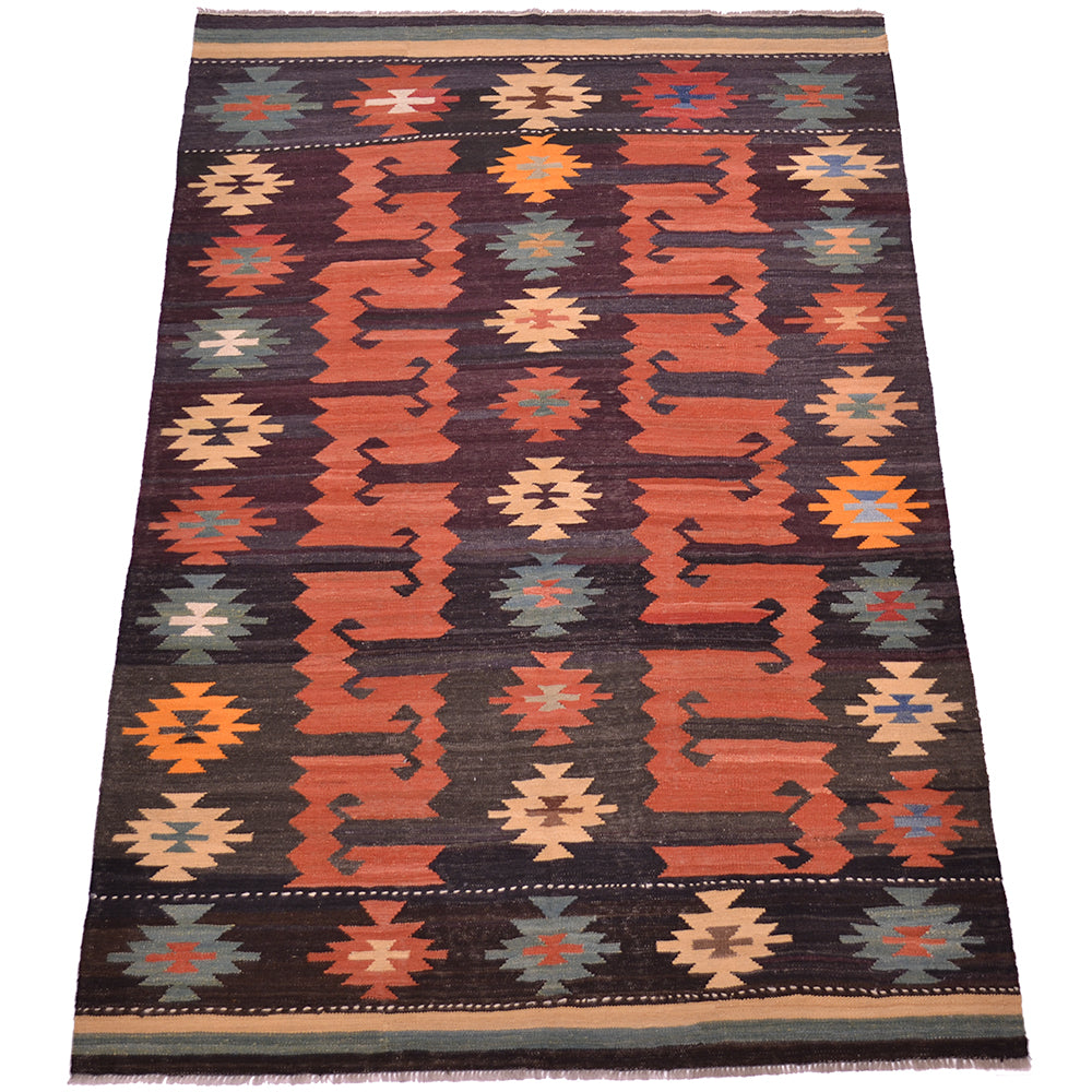 A 9x6 Afghan flatweave kilim area rug with a geometric tribal pattern, featuring a dark brown base with vertical bands of rust orange, beige, and muted blue-green accents.