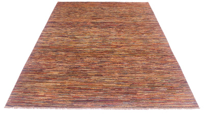 A rectangular handwoven striped Gabbeh area rug with a textured, horizontal striped pattern in earthy tones of brown, rust red, orange, and beige, shown flat against a white background.