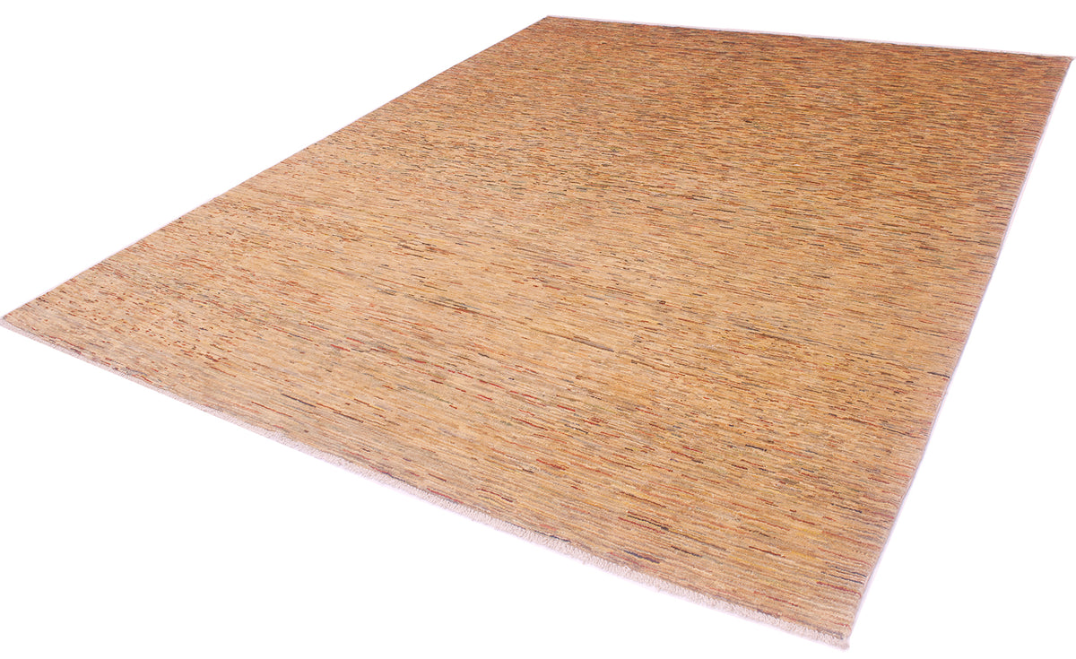 A Afghan Gabbeh carpet with a textured, natural tan and brown pattern, shown at an angle on a white background.