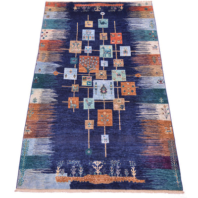 Handmade Loribaft carpet with central cross motif on navy and rust tones