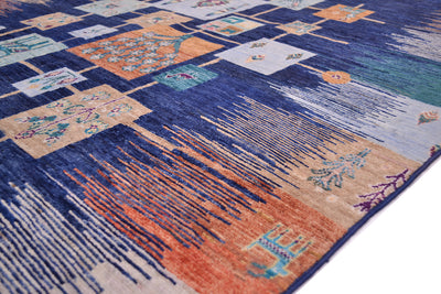 Loribaft carpet corner detail with striped texture in orange, blue, and beige blocks