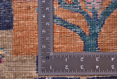 Loribaft carpet weave close-up with measurement ruler over orange and blue patchwork
