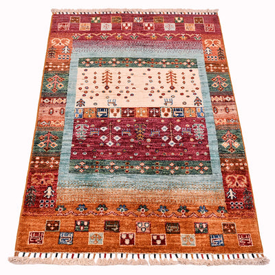 Loribaft Gabbeh Afghan rug front view with central cream panel, multicolour borders, and fringe ends
