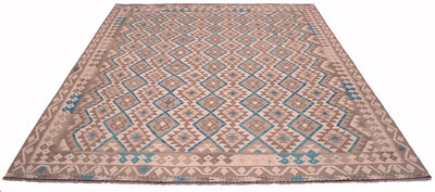 A large Afghan Kilim area rug with a geometric diamond pattern in beige, brown, and turquoise blue, shown from a top-down perspective against a white background.