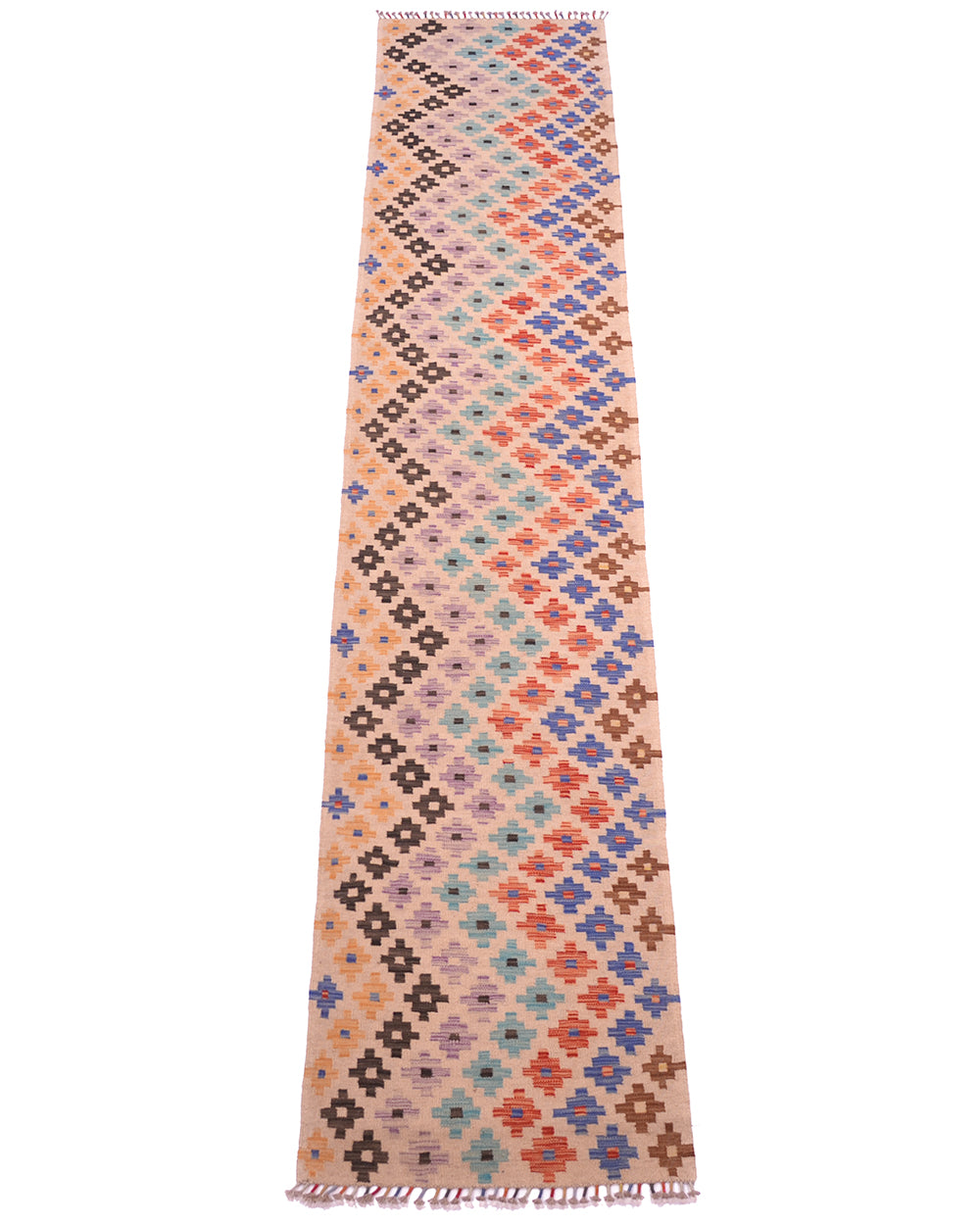 A 4m long, narrow Long Multicolour Kilim Runner rug with a multicolour geometric ziggurat diamond pattern on a beige background, finished with fringed edges.