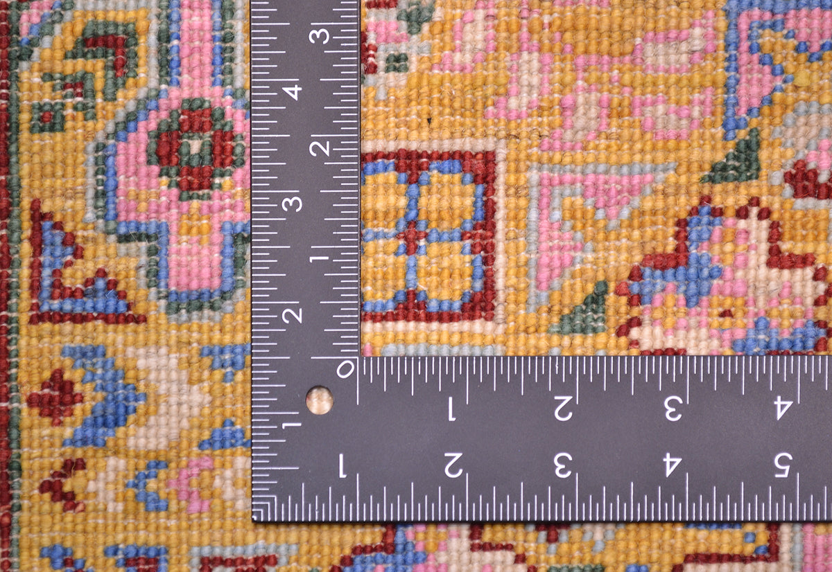 Detail of back of Afghan Mamluk runner in yellow, blue and pink.