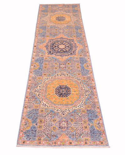 Handwoven pure wolol runner with light colours of blue, pink and golden ochres