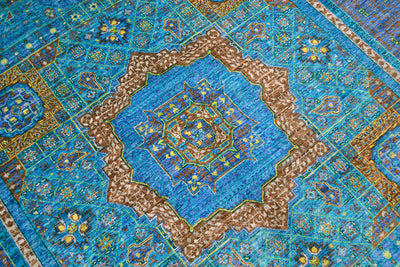 Detail of  geometric Mamluk medallion with brown and turquoise