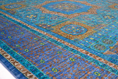 side view and detail of filigree blue border of fine afghan mamluk carpet.