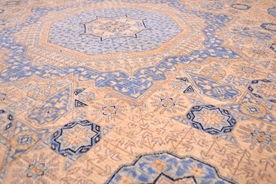 Geometric devices in cream and blue and beige of handknotted mamluk carpet