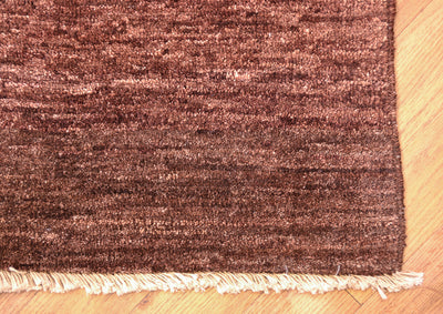Handmade and hand-knotted Modern design Afghan Chubi Carpet with parqueted central design and wide brown plain border.
