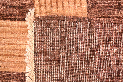 Handmade and hand-knotted Modern design Afghan Chubi Carpet with parqueted central design and wide brown plain border.