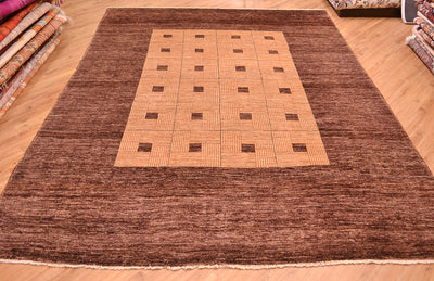 Handmade and hand-knotted Modern design Afghan Chubi Carpet with parqueted central design and wide brown plain border.