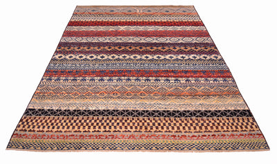 Overall view of modern geometric carpet with multitudes of geometrrc motifs with variety of colours made with natural vegetable dyes. Highly geometric carpet.