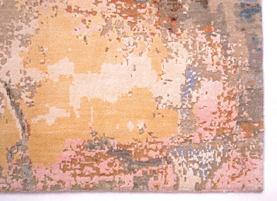Detail of eroded look of abstract modern carpet with cream and gold highlights. Finely knotte with a background of pure wool pile.