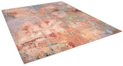 Angled view of modern abstract expressionistic carpet with pure wool and silk pile. Variety of warm and cool tones of greens, blues and terracottas. Hints of deep red and black. Cream ivory white silk areas.