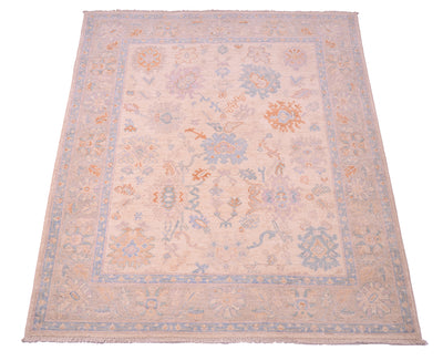 All over floral design Afghan Ushal Rug with soft terracotta and seagreen floral motifs