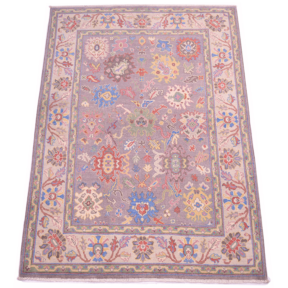 Decorative floral design Oushak rug with soft hues and cream and grey. Handknotted with pure wool pile