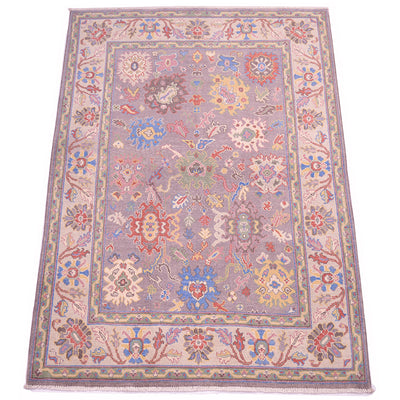Decorative floral design Oushak rug with soft hues and cream and grey. Handknotted with pure wool pile