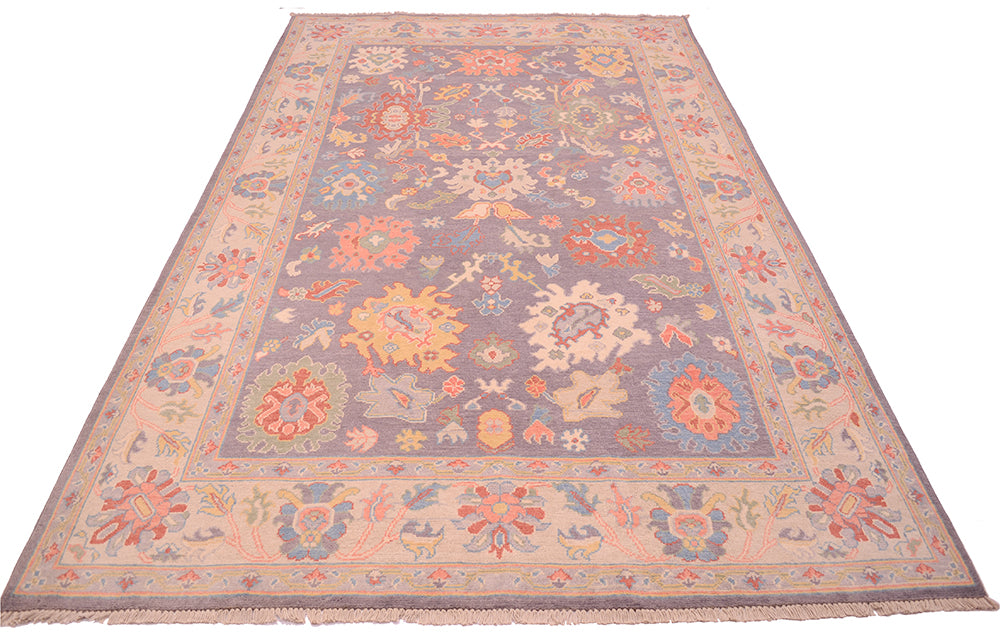 Cream border and grey field of calssic Ushak carpet in floral design
