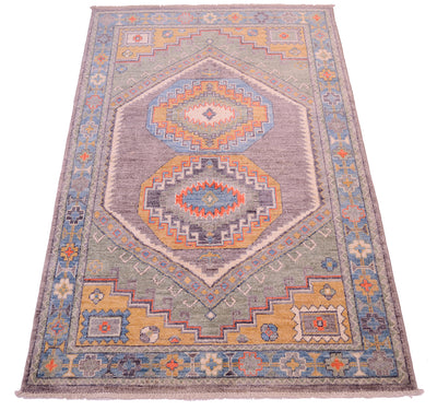 Geometric field and border of handknotted Oushak Rug
