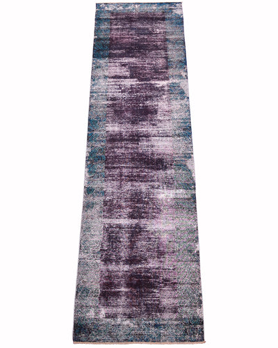 Handmade hallway/corridor runner with a distressed, vintage-style pattern in shades of purple-aubergine and teal border with traditional boteh patterning Shown flat against a solid white background.