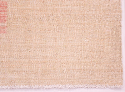 Close up detail of Afghan kilim with cream-beige weft threads and white cotton warps with cotton warp fringes.