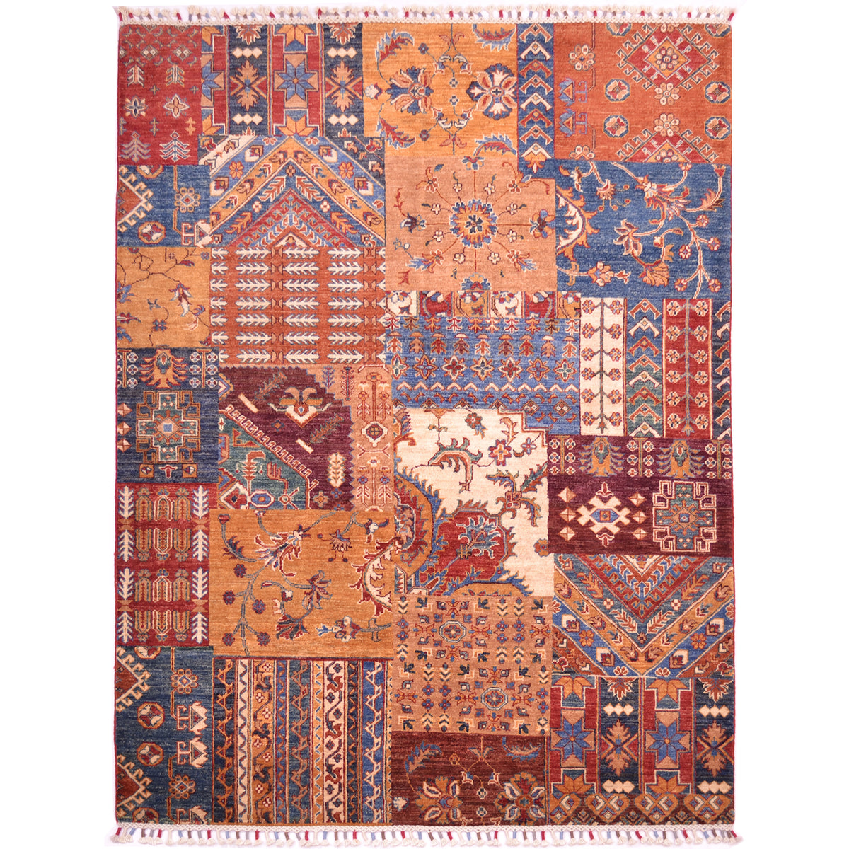 Patchwork design rug with all over design in colours of ochre, rust-red, burnt orange, blue, brown, green and cream. 