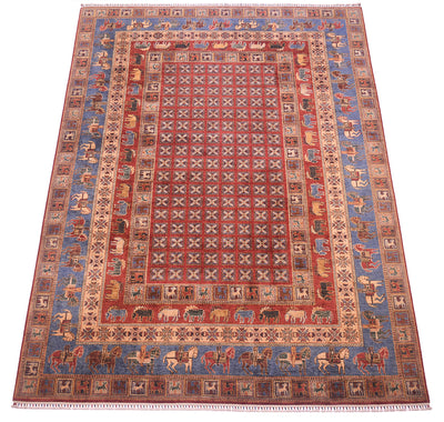 A traditional Handmade Afghan Pazyryk carpet with a red central field, blue borders, and beige/cream details, featuring stylized animal motifs including horses and elephants.