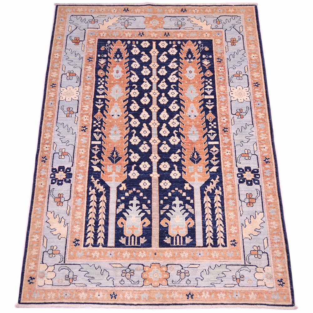 A 7x5 rectangular traditional Handmade Pictorial Afghan rug with a navy blue with cypress tree pattern central field, flanked by rust and pale blue borders with floral and geometric motifs.