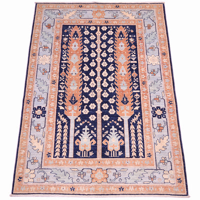 A 7x5 rectangular traditional Handmade Pictorial Afghan rug with a navy blue with cypress tree pattern central field, flanked by rust and pale blue borders with floral and geometric motifs.