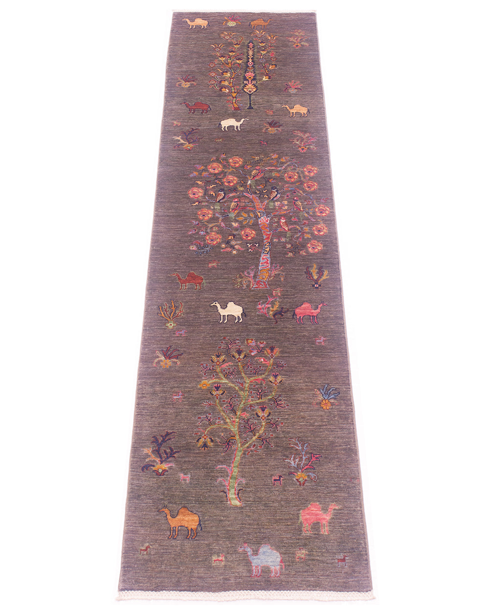 A long rectangular Pictorial grey Loribaft runner with a pewter-grey background, featuring stylised tree motifs and small animals in pink, orange, cream, and green, shown flat against a white background.